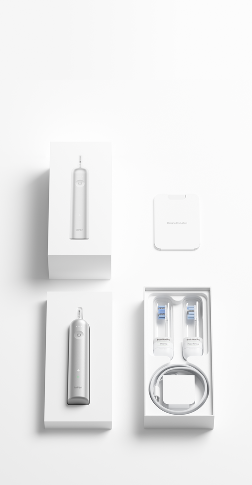 Laifen Wave Pro 電動牙刷包裝內含牙刷、專業美白與除菌斑刷頭及無線充電器與入門指南，滿足用家潔齒需求。